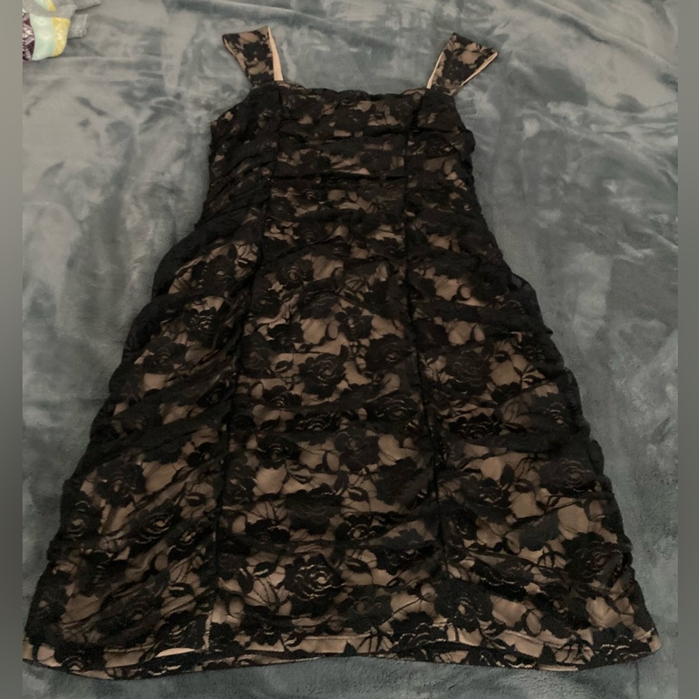 Beautiful black stretch lace sexy dress. Perfect for Halloween witch dress up.